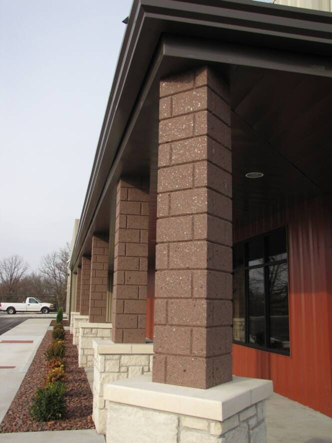 Column and stone base detail at a commercial entry