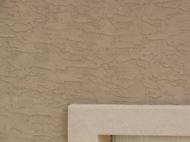 Close-up of a heavy troweled sand finish