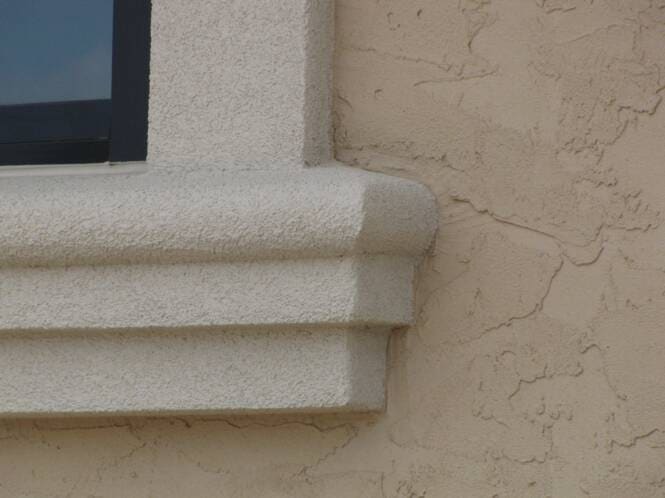 Sill and apron detail below a window opening
