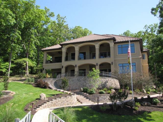 Mediterranean-style residence with a tile roof and arched loggia