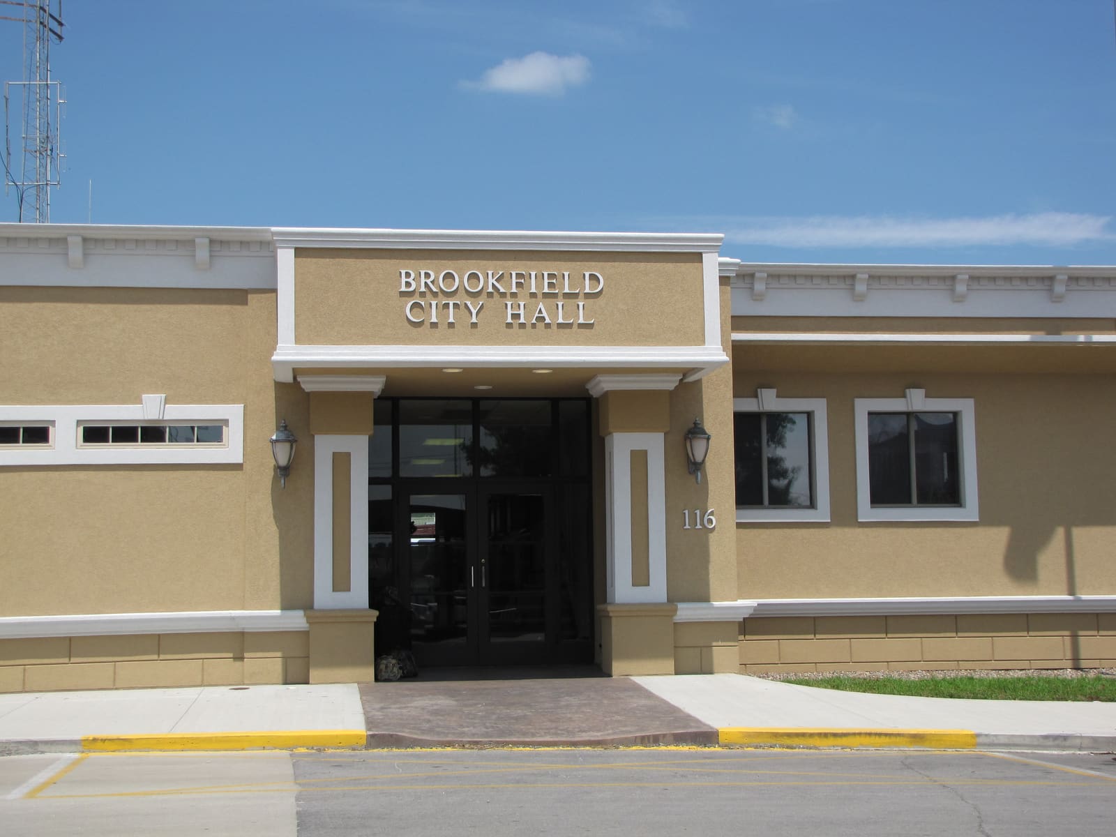 Municipal building entrance finished in stucco